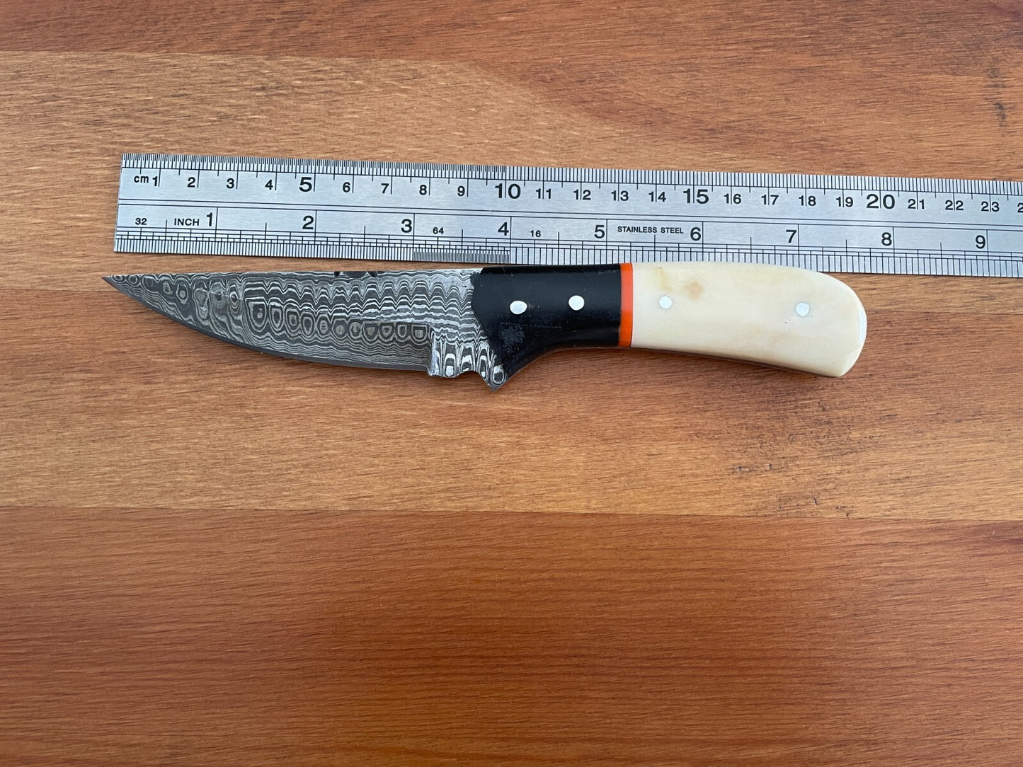 4 in. Damascus Handmade Skinner Knife Camel bone and Bullhorn / Leather Sheath