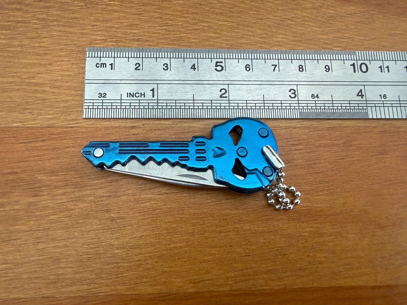 Titanium Blue Finish Skull Key Ring Knife 1.8-in Blade With Bottle Opener  Spain