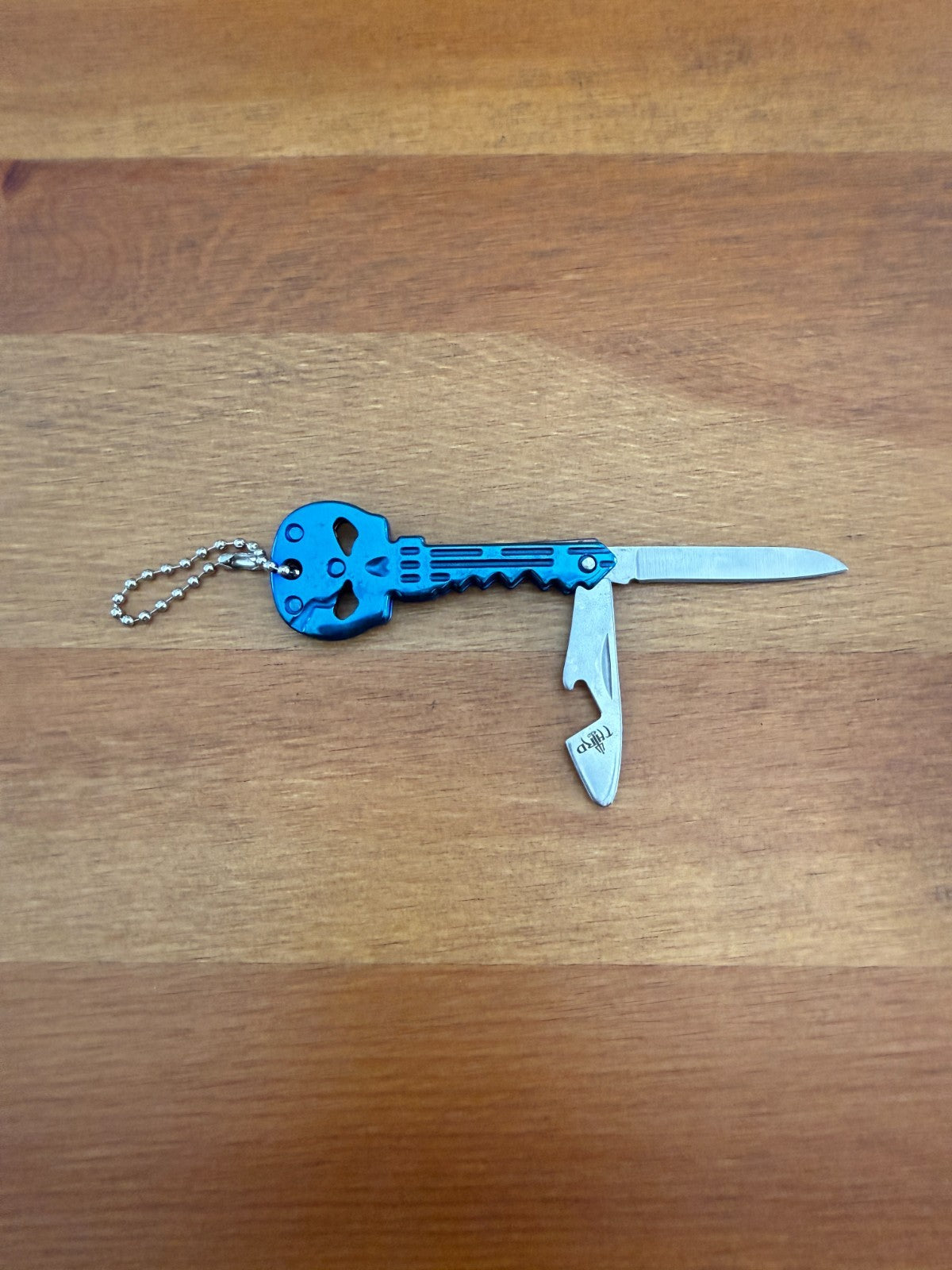 Titanium Blue Finish Skull Key Ring Knife 1.8-in Blade With Bottle Opener  Spain