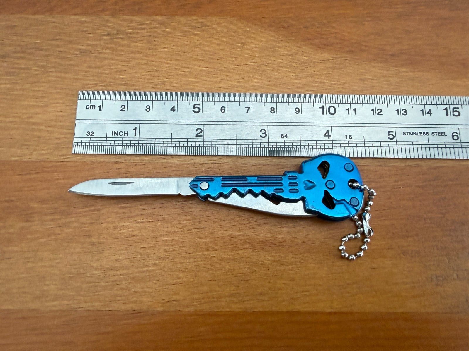 Titanium Blue Finish Skull Key Ring Knife 1.8-in Blade With Bottle Opener  Spain
